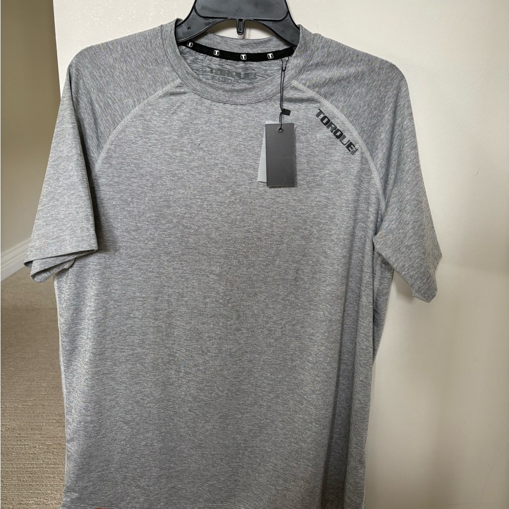 Brand new with tag. Men's Heather Gray Athletic Short Sleeve TORQUE tee. Sz Med